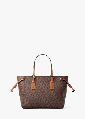 michael kors voyager extra small signature logo convertible crossbody bag