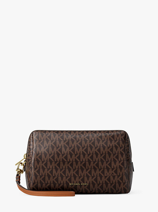 حقيبة زادي الكبيرة لمستحضرات التجميل بشعار الماركة michael kors حقيبة زادي الكبيرة لمستحضرات التجميل بشعار الماركة