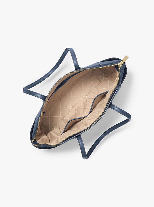 حقيبة مارلين متوسطة الحجم من جلد سافيانو michael kors حقيبة مارلين متوسطة الحجم من جلد سافيانو