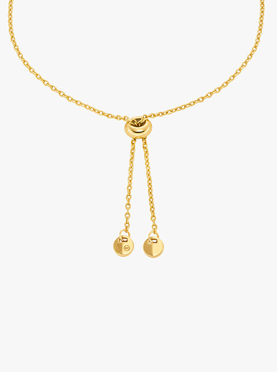 michael kors سوار مايكل كورس منزلق مطلي بالذهب عيار ١٤ قيراطًا من الفضة الإسترليني بتصميم قطع آشر