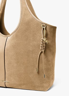 michael kors gold tone and braided cord bag charm