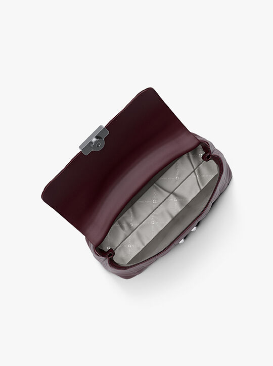 michael kors حقيبة تريبيكا الجلدية المبطنة متوسطة الحجم