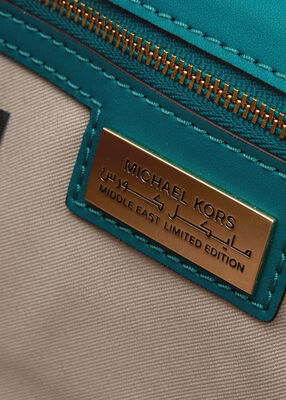 michael kors carmine medium pebbled leather pochette