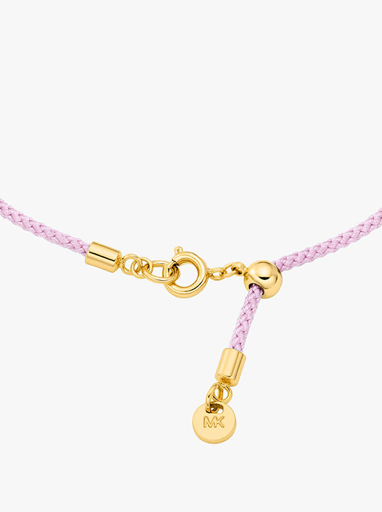 سوار مرصع بشعار الماركة ذهبي اللون michael kors سوار مرصع بشعار الماركة ذهبي اللون