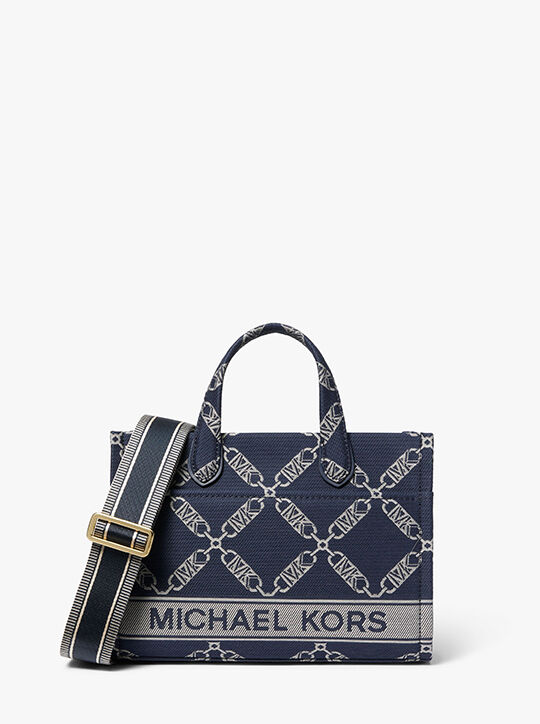 حقيبة ماسنجر جيجي من الجاكار بشعار إمباير صغيرة michael kors حقيبة ماسنجر جيجي من الجاكار بشعار إمباير صغيرة