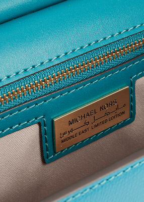 michael kors tribeca extra small signature logo convertible crossbody bag