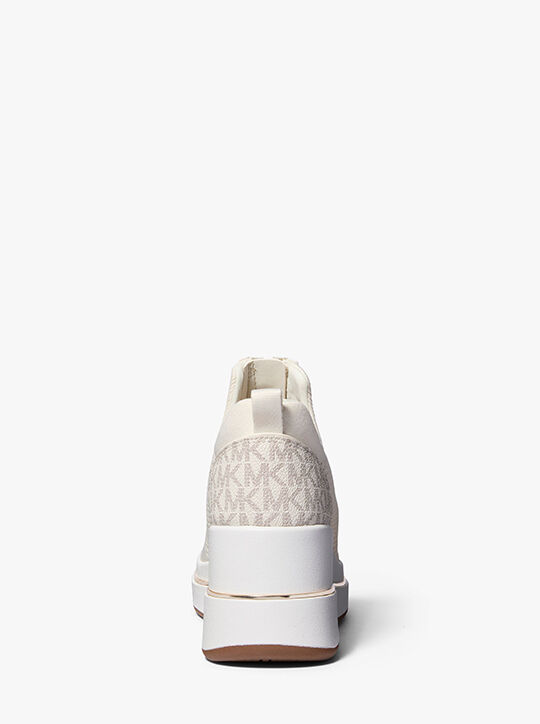 حذاء رياضي إيمي بكعب إسفين بسحاب شبكي michael kors حذاء رياضي إيمي بكعب إسفين بسحاب شبكي