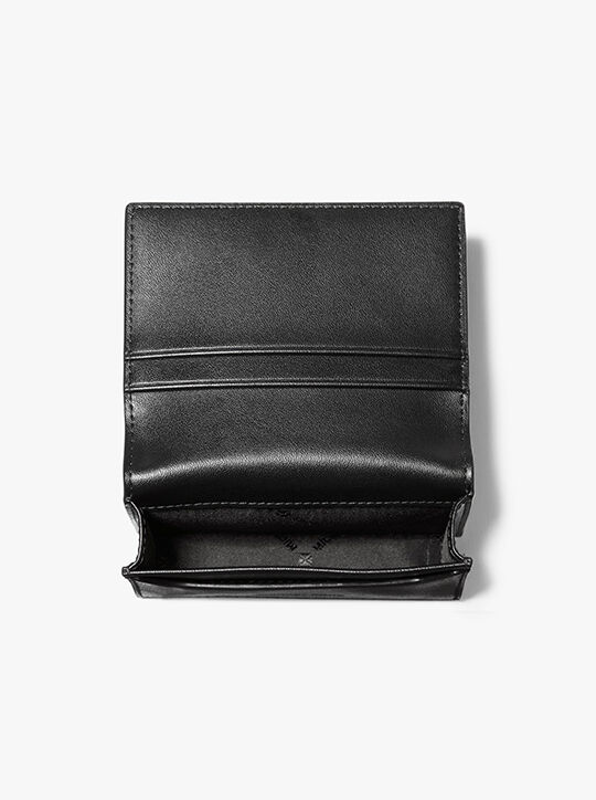 محفظة كوبر المميزة بشعار الماركة michael kors محفظة كوبر المميزة بشعار الماركة