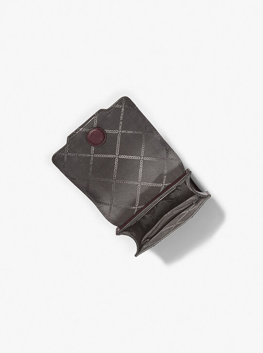 michael kors حقيبة كروس جلدية للهواتف الذكية من فاريك