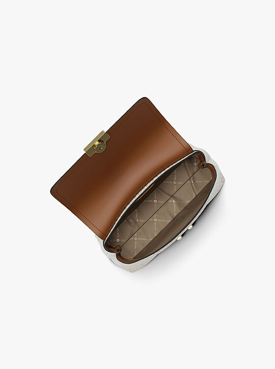 حقيبة تريبيكا صغيرة جدًا بشعار الماركة michael kors حقيبة تريبيكا صغيرة جدًا بشعار الماركة