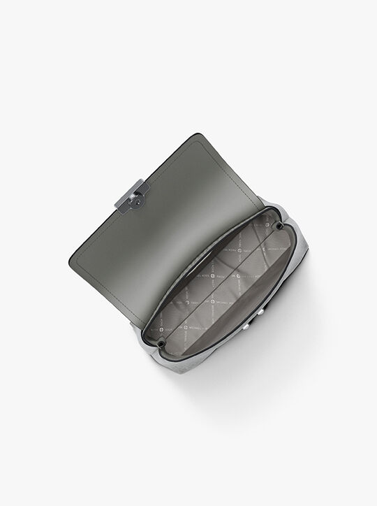 michael kors حقيبة تريبيكا صغيرة جدًا بشعار الماركة