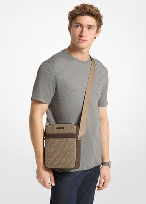 michael kors cooper signature logo flight bag