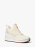 michael kors emmy mesh zip up wedge trainer
