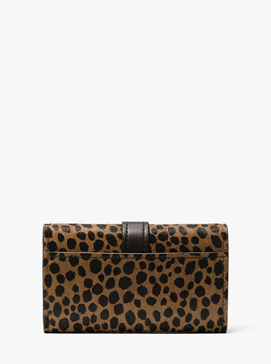 michael kors nolita medium cheetah print calf hair tri fold wallet