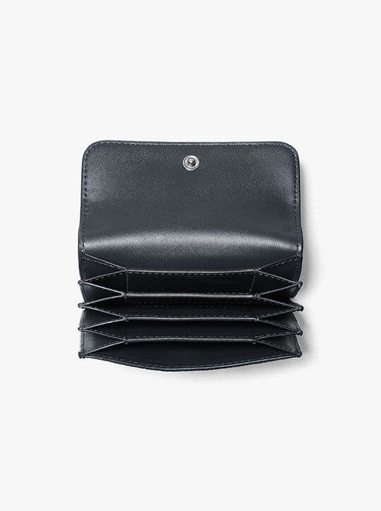 حافظة بطاقة شعار الأكورديون من كوبر michael kors حافظة بطاقة شعار الأكورديون من كوبر