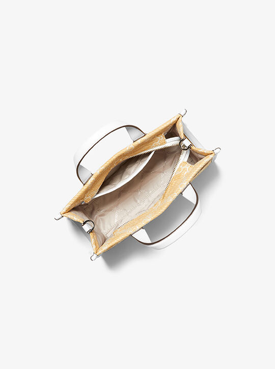 حقيبة ماسنجر جيجي من قماش الجاكار بشعار إمباير صغيرة michael kors حقيبة ماسنجر جيجي من قماش الجاكار بشعار إمباير صغيرة