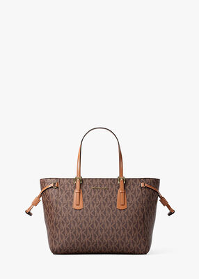 michael kors voyager extra small signature logo convertible crossbody bag