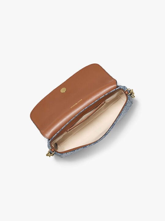 حقيبة كروسبودي نوليتا جاكار صغيرة من قماش الدنيم michael kors حقيبة كروسبودي نوليتا جاكار صغيرة من قماش الدنيم